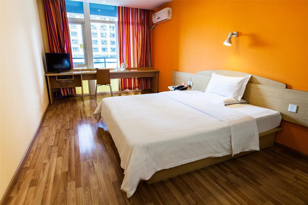 7Days Inn Premium Guangzhou Tianhe West Tiyu Road Subway Station Rum bild